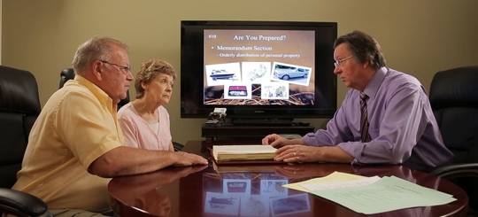 2 older clients meeting with an attorney